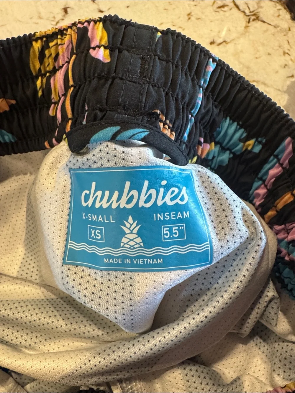 chubbies Black Swim Trunks with Pink, Blue & Yellow Tropical Palms